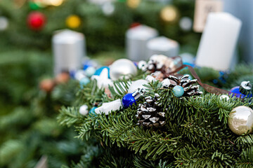 advent wreath with candles at the Christmas market, close-up, selective focus