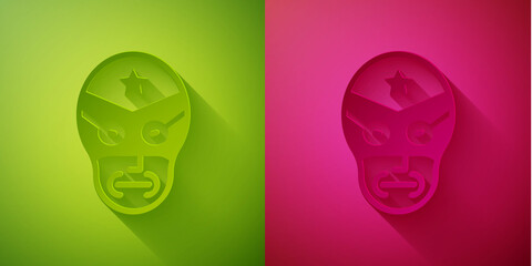Paper cut Mexican wrestler icon isolated on green and pink background. Paper art style. Vector.