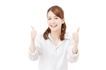 グッドサインする女性