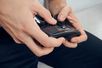 Gamepad male hands close-up video game addiction office technology