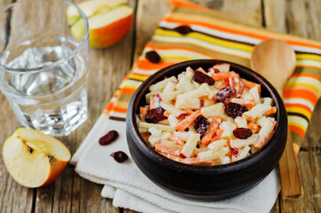 Carrot apple dried cranberries slaw