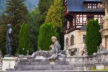 Fototapeta premium Statue of a Woman Situated in Front of Peles Castle, Sinaia, Prahova, Romania