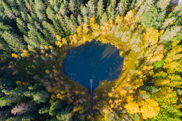 Aerial view of small forest lake Haransilma in Lahti, Finland. The diameter of lake is about 50...