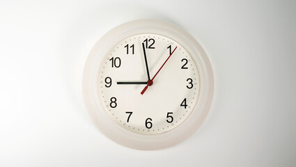 White clock isolated on white background Showtime 08.58 am, Time concept..