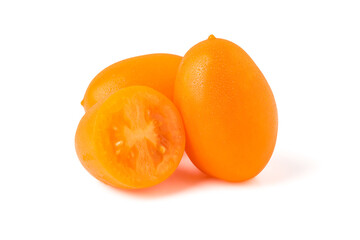 Group of yellow tomatoes isolated on white background