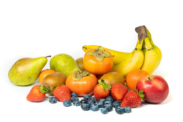Lots of fresh fruit isolated on a white background, copy space