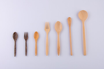 Kitchenware set of wooden spoon and wooden fork isolated on white background
