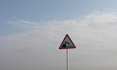 sign on blue sky