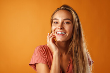Portrait of a young beautiful happy woman smiling