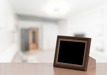 photo frame on the wooden table