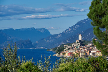 Fototapeta premium Panoramic view of the old town of Malcesine. Italian resort on Lake Garda. Palazzo dei Capitani is a historic building in Italy. Scaliger Castle in Malcesine Lake Garda Italy.