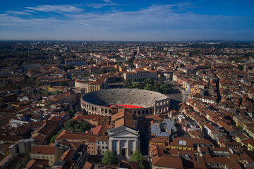 Fototapeta premium Aerial drone photo from iconic arena and city hall in Bra square of beautiful city of Verona. Arena is a Roman amphitheatre in Piazza Brà, Italy. Verona Arena aerial panoramic view.