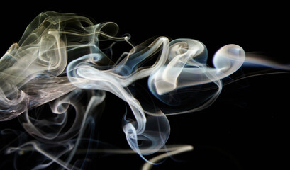 Yellow colorful smoke swirl © PixieMe