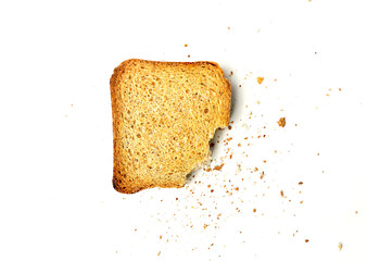 Biscuits and bread crumbs on white background.