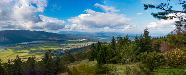 Fototapeta na wymiar panorama landscape with mountains, lake and blue sky