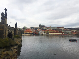 Fototapeta na wymiar cityscape of Vltava River and Charles bridge from Old town in Prague, Czech Republic