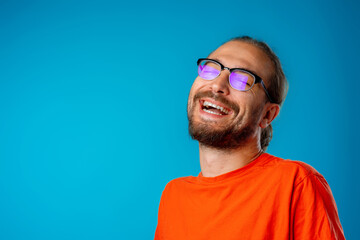 Portrait of a funny nerd man in glasses