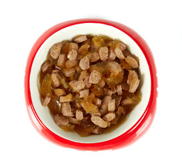 soft cat food in a cat dish