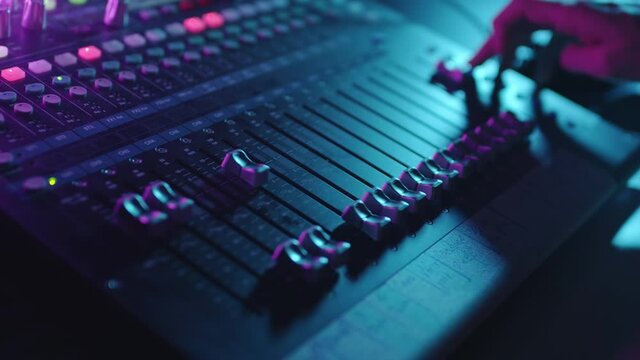 Electric machine on table for working of sound designer or club dj at party in nightclub. Occupation for modern lifestyle, objects for listen at background. Musical player for tuning of stage close up