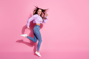 Full length profile side photo of pretty girl jump run after season discounts wear style stylish pullover shoes isolated over pastel color background