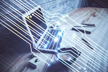 Double exposure of desktop with personal computer on background and tech theme drawing. Concept of data analysis.