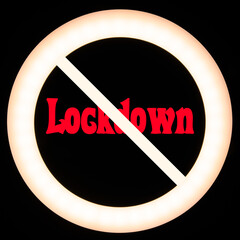 Scritta lockdown all'interno di un neon luminoso su sfondo nero. 
