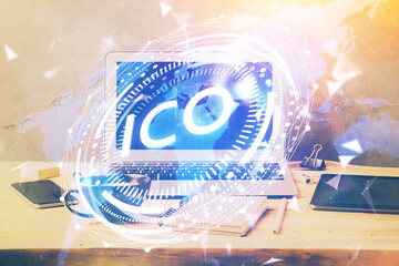 Double exposure of blockchain theme hologram and table with computer background. Concept of bitcoin crypto currency.