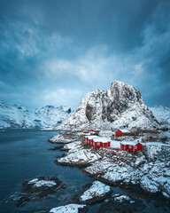 Famous Norwegian cabins covered by snow in Hamnøy in Lofoten.