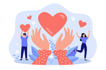 Hands holding heart symbol flat vector illustration. Happy cartoon people giving love or hope and donating help. Friendship, assistance and charity concept
