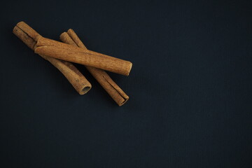 Ingredients and spices for pastries and drinks. Cinnamon sticks on
