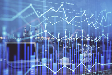 Stock market graph and table with computer background. Multi exposure. Concept of financial analysis.