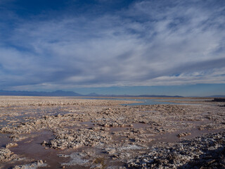 Overview of the amazing Salar de Atacama with its salt crystals in the foreground.
Chile.
