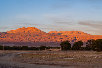 Fototapeta na wymiar Scenery in a road trip through the Atacama desert region, at sunset. Chile.