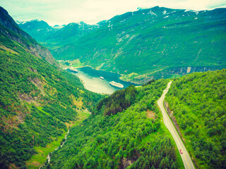 Fjord Geirangerfjord with ferry boat, Norway.