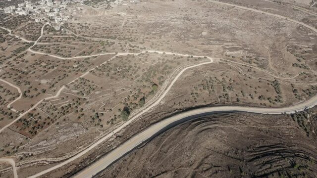 Israel Palestine border in Jerusalem - aerial view
drone image divide Beit hanina (Abu Dahuk) and Ramat Shlomo neighborhoods northwest East Jerusalem 
