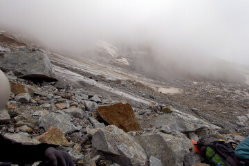 Glacier on a mountain pass. Glacier under the Koshtan pass (3513 meters above sea level). Caucasus, Russia.
