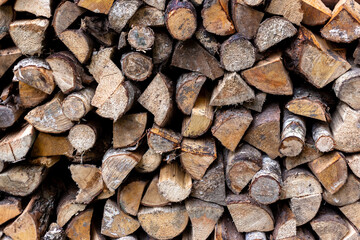 Chopped firewood stacked together. Fuel.