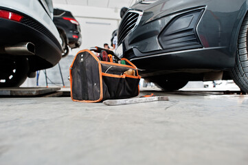 Car repair and maintenance theme. Cars in auto service.