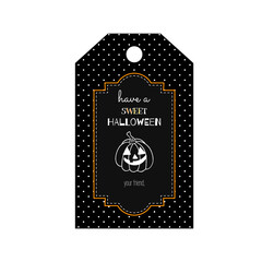Halloween favor gift treat bag tag. Black background with white polka dot pattern chalk drawing of Jack o lantern pumpkin lettering