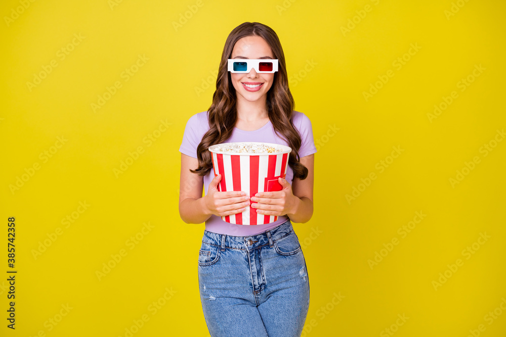 Sticker portrait of attractive cheerful wavy-haired girl wearing eyewear eating corn watching film amusement