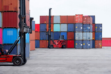 Mobile container handlers operating at the cargo terminal in the port.