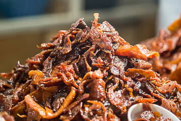 Selective focus of Thai Deep Fried dried pork, Thai street food market