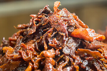 Selective focus of Thai Deep Fried dried pork, Thai street food market