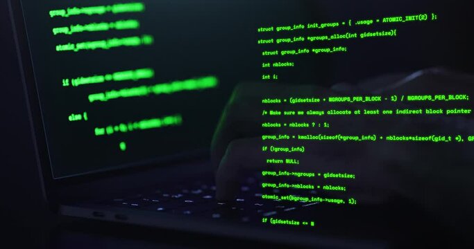 Hacker hands typing on a keyboard, close up view - Man coding using a notebook with overlayed text of meaningless code - IT and technology concepts