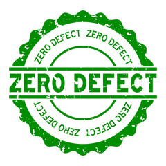 Grunge green zero defect word round rubber seal stamp on white background