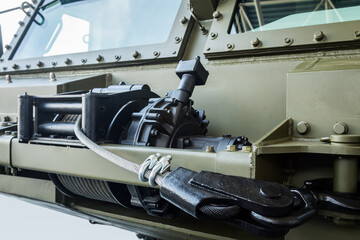 winch with a cable for self-healing is installed on military equipment or tractors