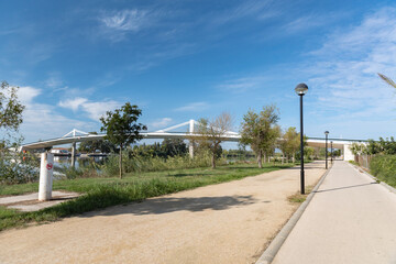 Fototapeta na wymiar Sant Jaume d Enveja new bridge Lo Passador over Ebro river Ebro Delta, Tarragona, Catalonia, Spain