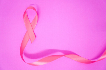 Obraz na płótnie Canvas Pink cancer awareness ribbon concept