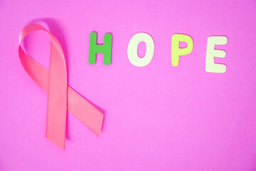 Pink cancer awareness ribbon concept