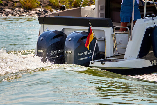 Yamaha outboard engines at the stern of a small motor boat for excursions in Gifhorn, Germany, August 9.,2020